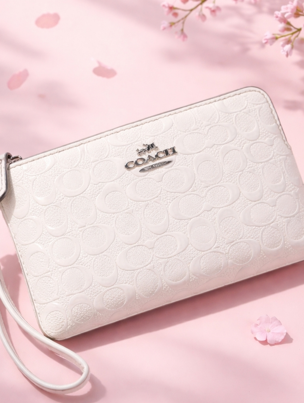 Coach Embossed Ivory Wristlet